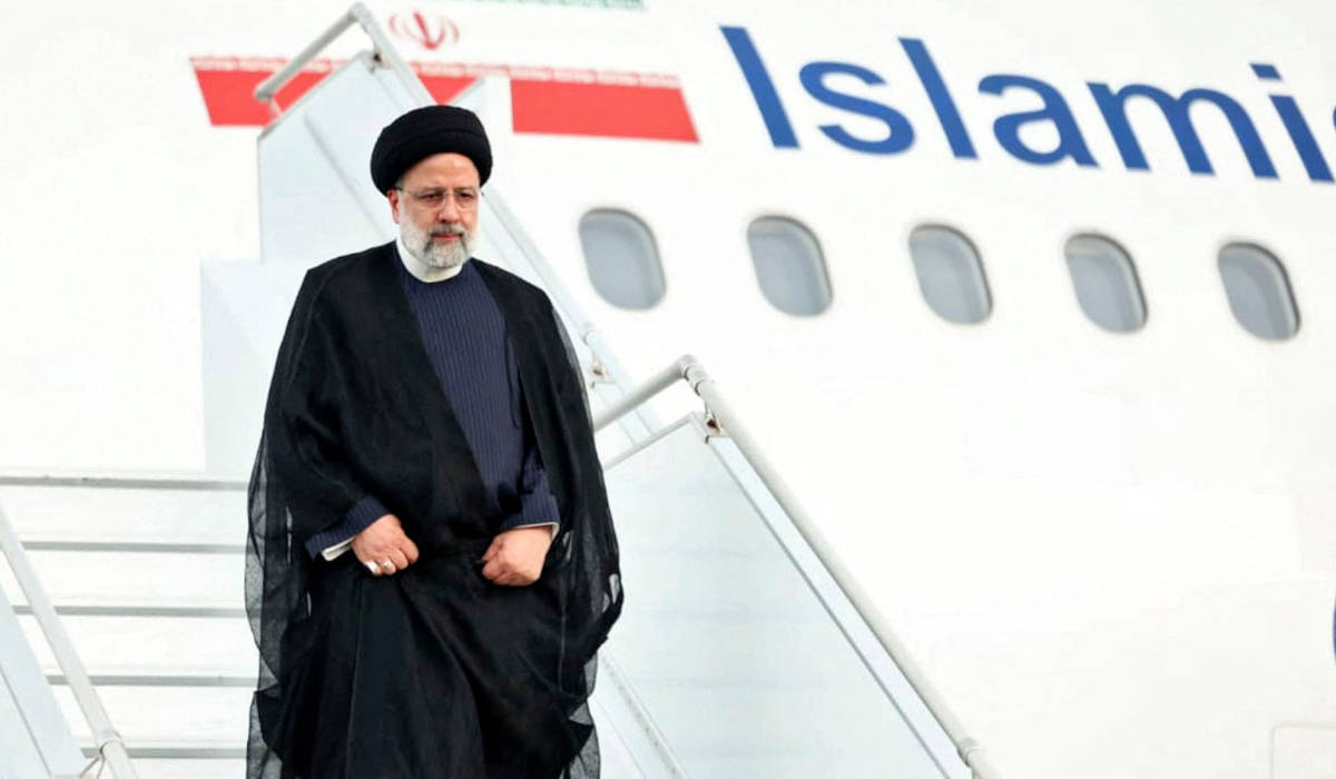 Handout picture released by Nicaragua's Presidency showing Iran's President Ebrahim Raisi disembarking from the plane upon landing at Augusto C. Sandino International Airport in Managua on June 13, 2023. (AFP)
