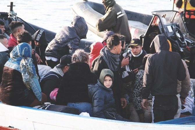 Migrants — mainly from sub-Saharan Africa — are stopped by Tunisian Maritime National Guard at sea near the coast of Sfax during an attempt to get to Italy. (File/AP)