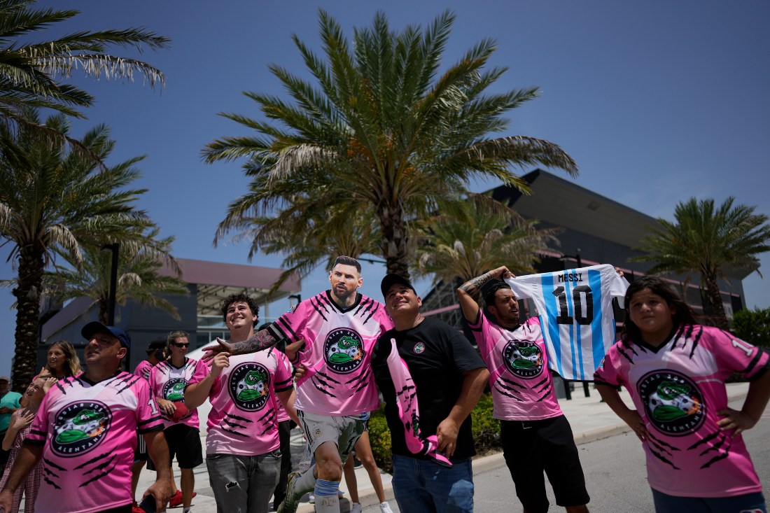 A group of South Florida fans wait outside DRV Pink Stadium, home of Inter Miami, in hopes of catching a glimpse of Argentine soccer superstar Lionel Messi Tuesday in Fort Lauderdale, Fla. Inter Miami announced plans to present Messi along with other new players at an event on July 16. (AP)