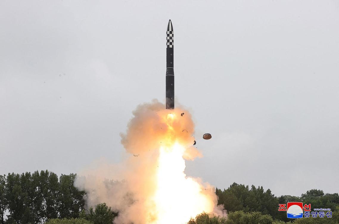 Above, the new intercontinental ballistic missile Hwasong-18 being test fired at an undisclosed location in North Korea on July 12, 2023. (KCNA via KNS/AFP)