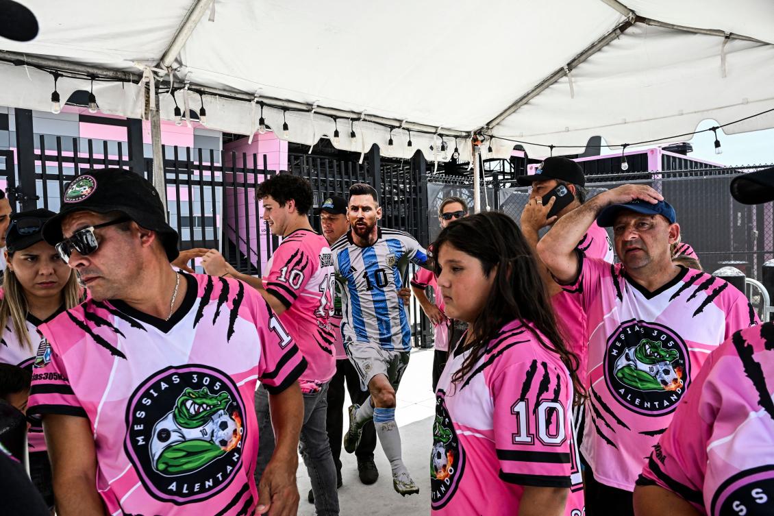 Fans of Argentina’s Lionel Messi wait for his arrival at the DRV PNK Stadium in Fort Lauderdale, Florida on July 11, 2023, ahead of his debut in the Major League Soccer (MLS) with Inter Miami. (AFP)