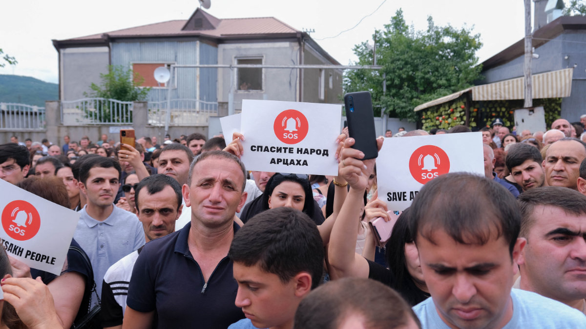 Residents protest in Stepanakert (also known as Khankendi) in the Nagorno-Karabakh region on July 14, 2023 to demand the reopening of a blockaded road linking the disputed region to Armenia and to decry crisis conditions in the region. (AFP)
