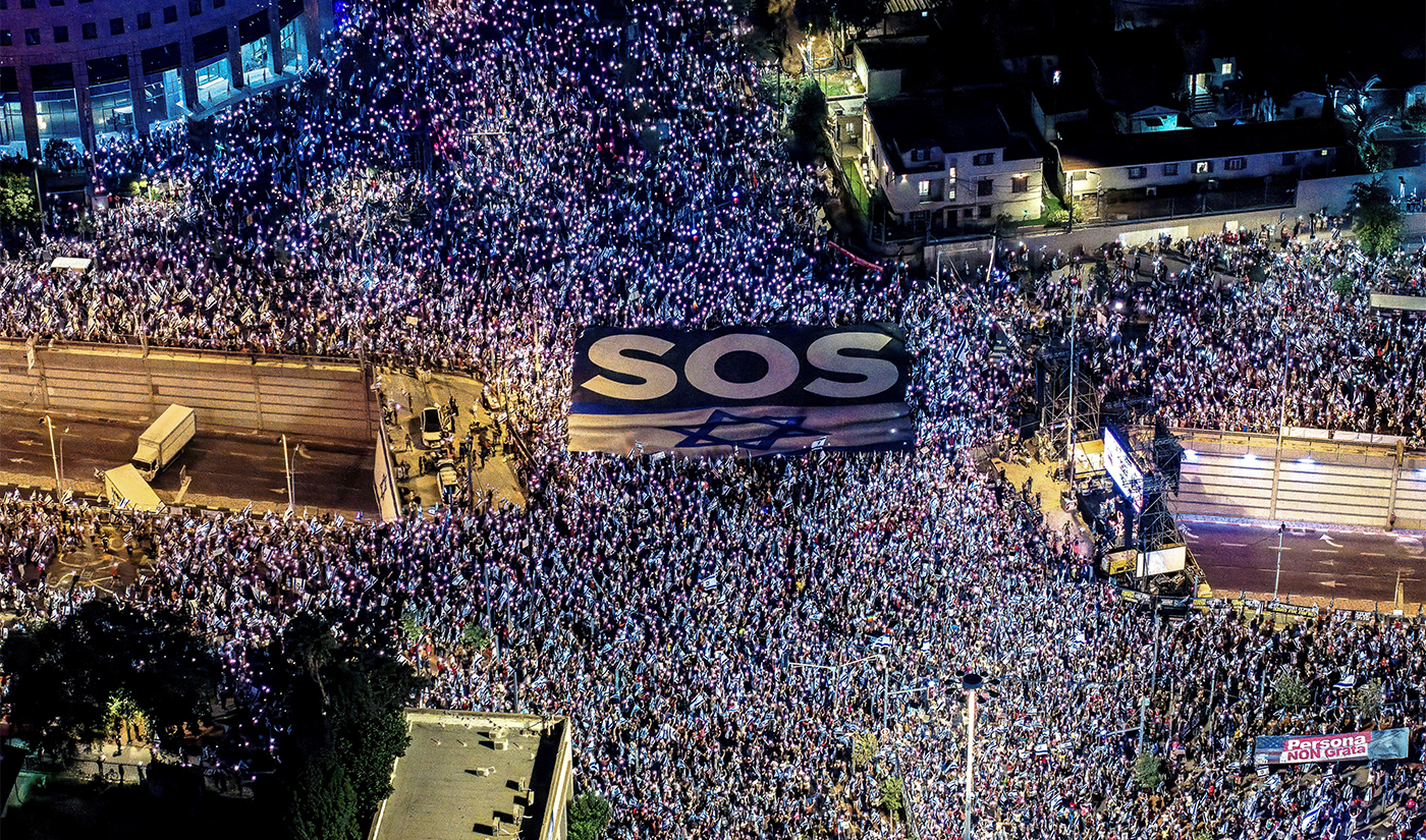 Israelis take part in a demonstration against Israeli Prime Minister Benjamin Netanyahu and his nationalist coalition government's judicial overhaul, in Tel Aviv on July 15, 2023. (REUTERS)