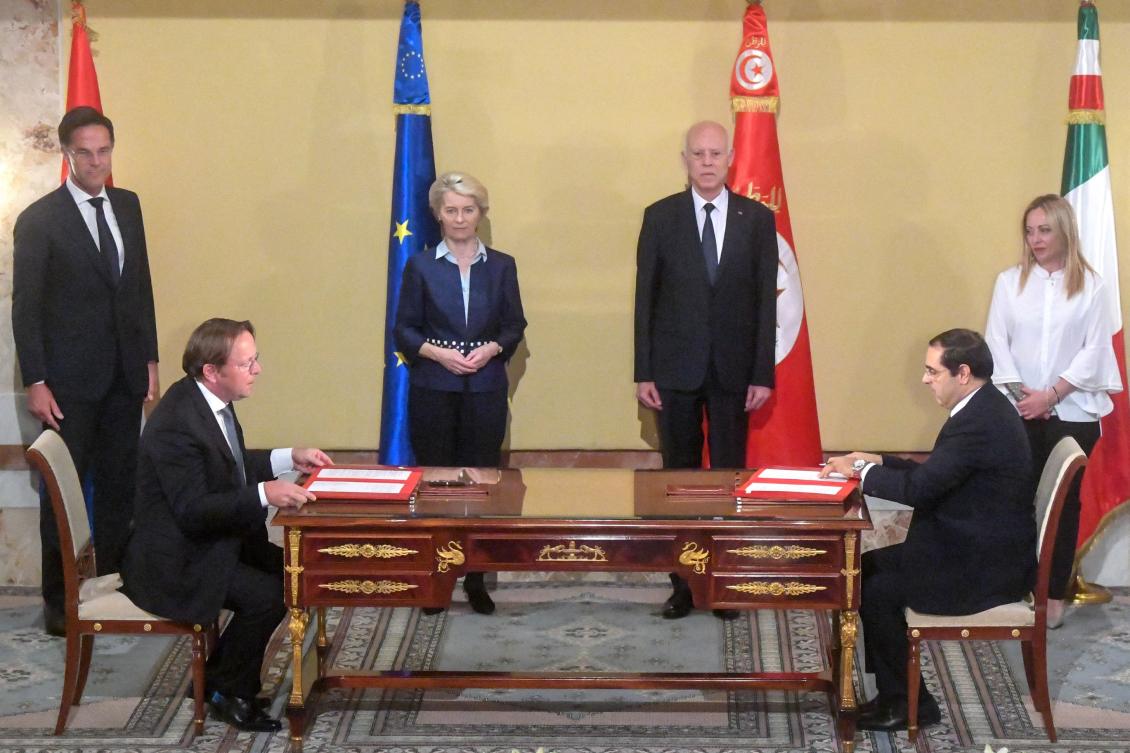 (L to R) The Netherlands’ Prime Minister Mark Rutte, European Commission President Ursula Von der Leyen, Tunisia’s President Kais Saied and Italy’s Prime Minister Giorgia Meloni watch the memorandum signing at the presidential palace in Tunis on July 16, 2023. (AFP)