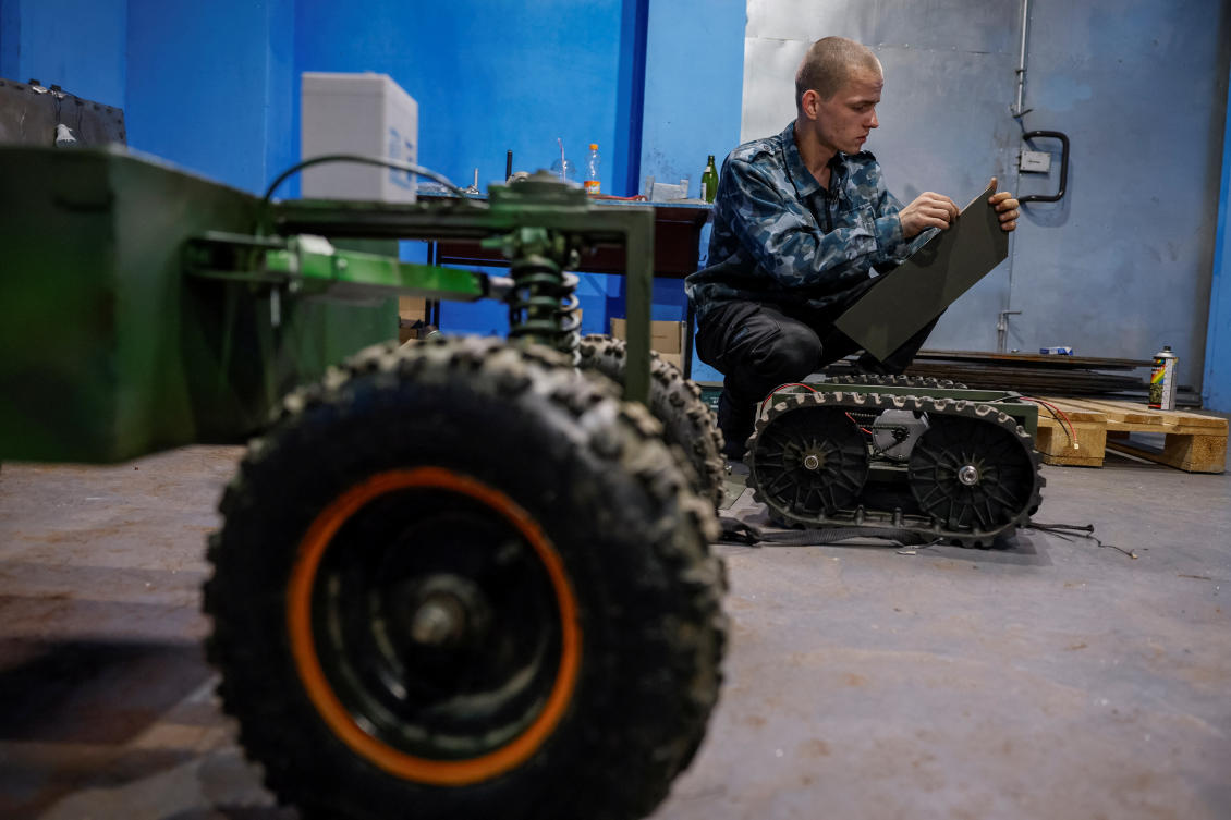 Yevhen Hnatok, 22, former Ukrainian serviceman, fixes an unmanned ground vehicle he made, in workshop, amid Russia's attack on Ukraine, in Kyiv region, Ukraine, July 5, 2023. (File/Reuters)