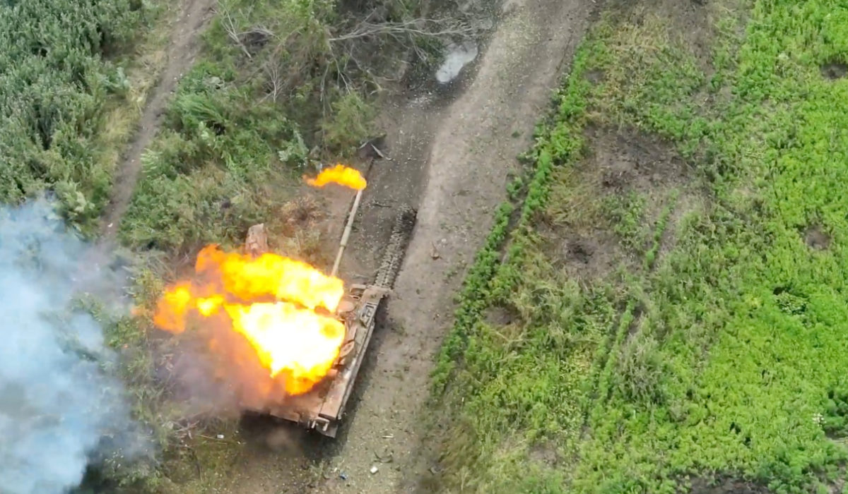 Drone footage shows a tank on fire after it was hit by ammunition from the air, amid Russia's attack on Ukraine, northwest of Bakhmut, Donetsk Region, Ukraine, in this still image from a video released by the Ukrainian army July 15, 2023. (REUTERS)