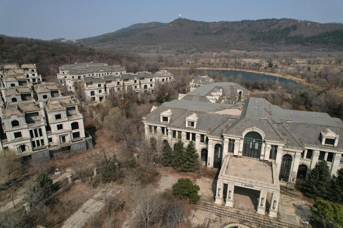 Ghost towns like the one in Shenyang — known as ‘rotten-tail’ homes in Chinese — now pockmark urban landscapes across the country. (AFP)