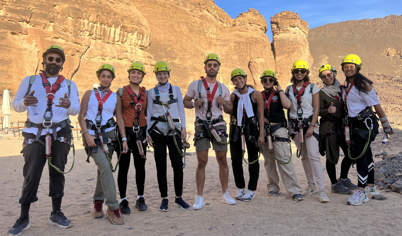 Tourists pose for a group photo before indulging in adrenaline-pumping activities, such as rock climbing, giant swing, and zipline. (AN photo by Nada Hameed)