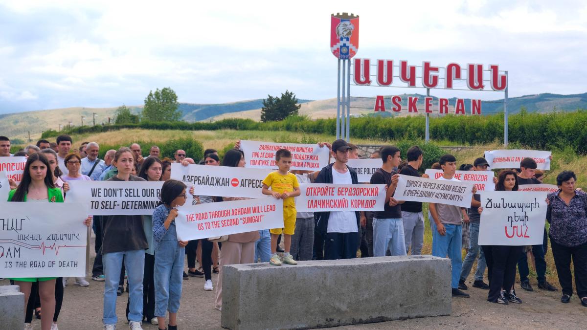 Activists block a road from Stepanakert, the capital of the self-proclaimed Nagorno-Karabakh region of Azerbaijan, to Azerbaijani Aghdam demanding the reopening of the blockaded Lachin Corridor linking Karabakh to Armenia on July 18, 2023. (AFP)