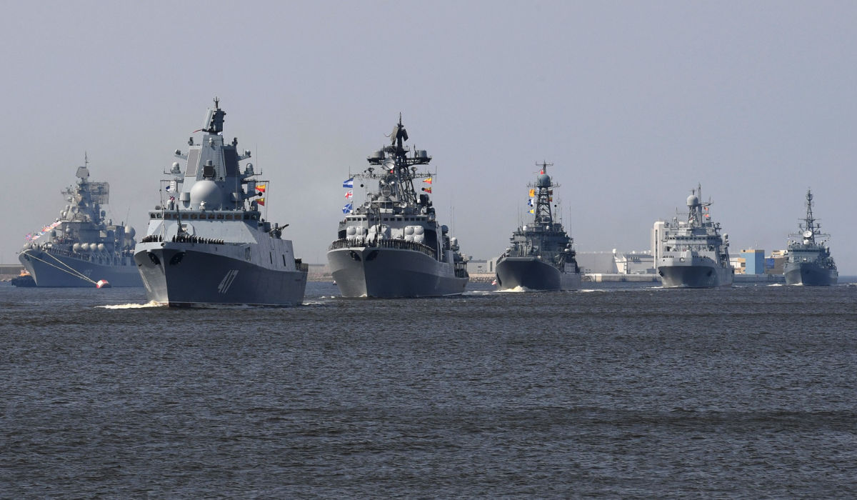 Russian navy ships, among them Russian Navy Frigate 'Admiral Gorshkov (2L), sail near Kronshtadt naval base outside Saint Petersburg on July 20, 2018, during a rehearsal for the Naval Parade. (AFP)