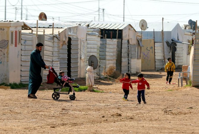 Syrian children play in the Zaatari refugee camp, 80 kilometers (50 miles) north of the Jordanian capital Amman on February 15, 2021. (AFP/File)