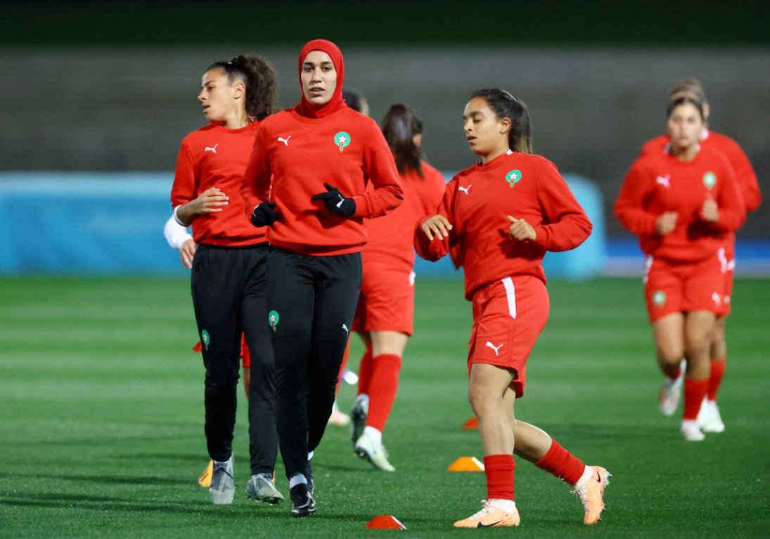 Morocco's Nouhaila Benzina with teammates during training Sunday ahead of their Women's World Cup match against Germany. (Reuters)