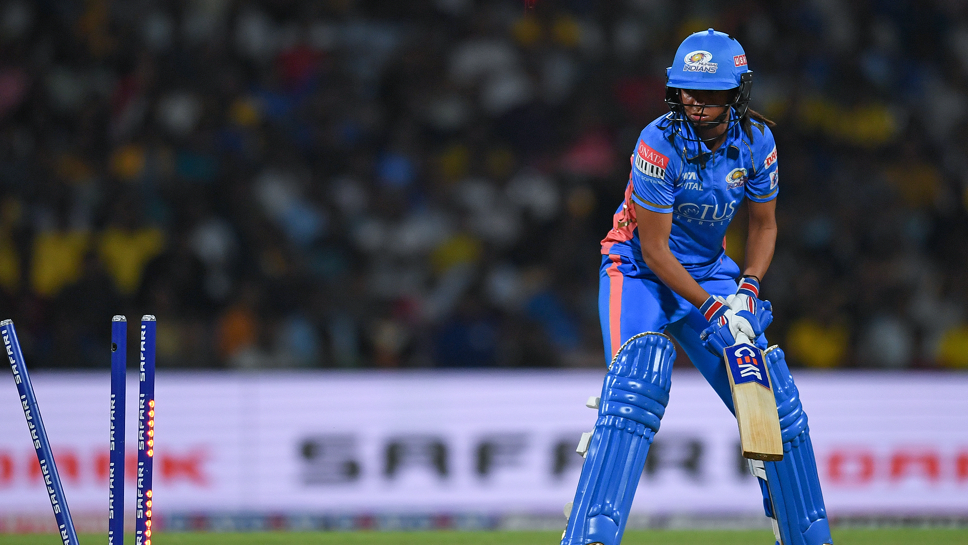 Mumbai Indians' captain Harmanpreet Kaur is clean bowled by UP Warriorz's Sophie Ecclestone (not pictured) during the 2023 Women's Premier League (WPL) Twenty20 cricket eliminator match between UP Warriorz and Mumbai Indians at the DY Patil Stadium in Navi Mumbai on March 24, 2023. (AFP/File)