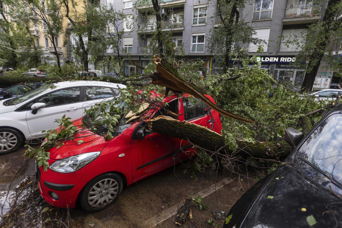 Milan in recent days has been pummeled by several storms with hail the size of tennis balls and whipped by strong winds. (AP)