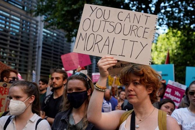 Protesters gather outside the Home Office in London to demonstrate against the UK government's intention to deport asylum-seekers to Rwanda. (File/AFP)