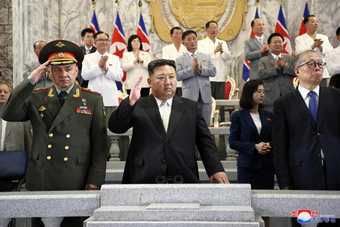 From left: Russia’s Defense Minister Sergei Shoigu, North Korean leader Kim Jong Un and Chinese Communist Party politburo member Li Hongzhong during a military parade in Pyongyang on July 27, 2023. (KCNA via Reuters)