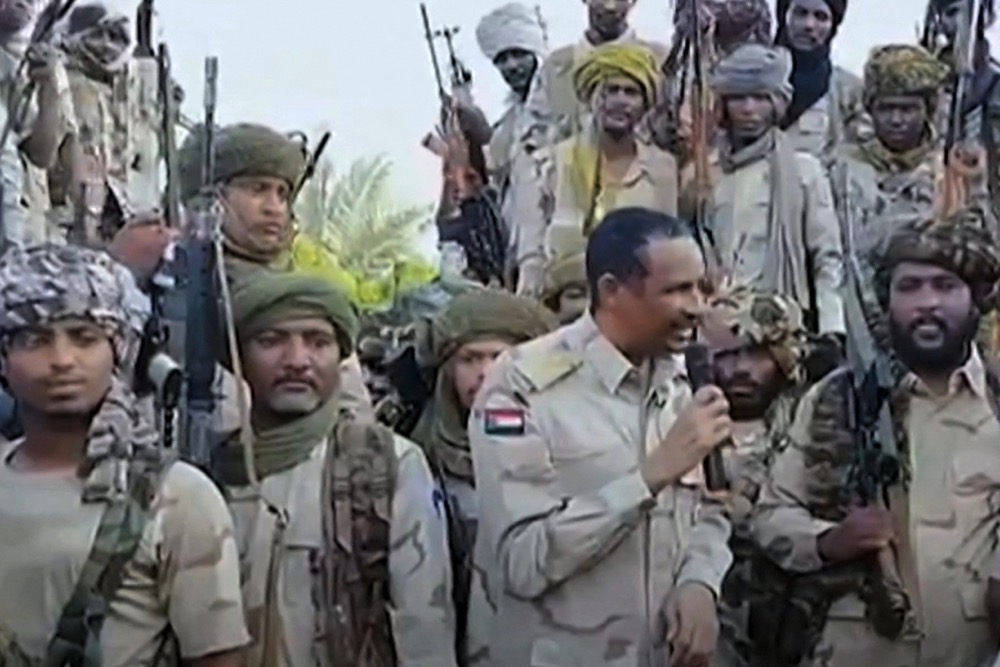 An image grab taken from a handout video posted on the Sudanese paramilitary Rapid Support Forces (RSF) page on Twitter, rebranded as X, on July 28, 2023 shows its commander Mohamed Hamdan Daglo addressing RSF fighters. (AFP/Twitter: Sudan's Rapid Support Forces)