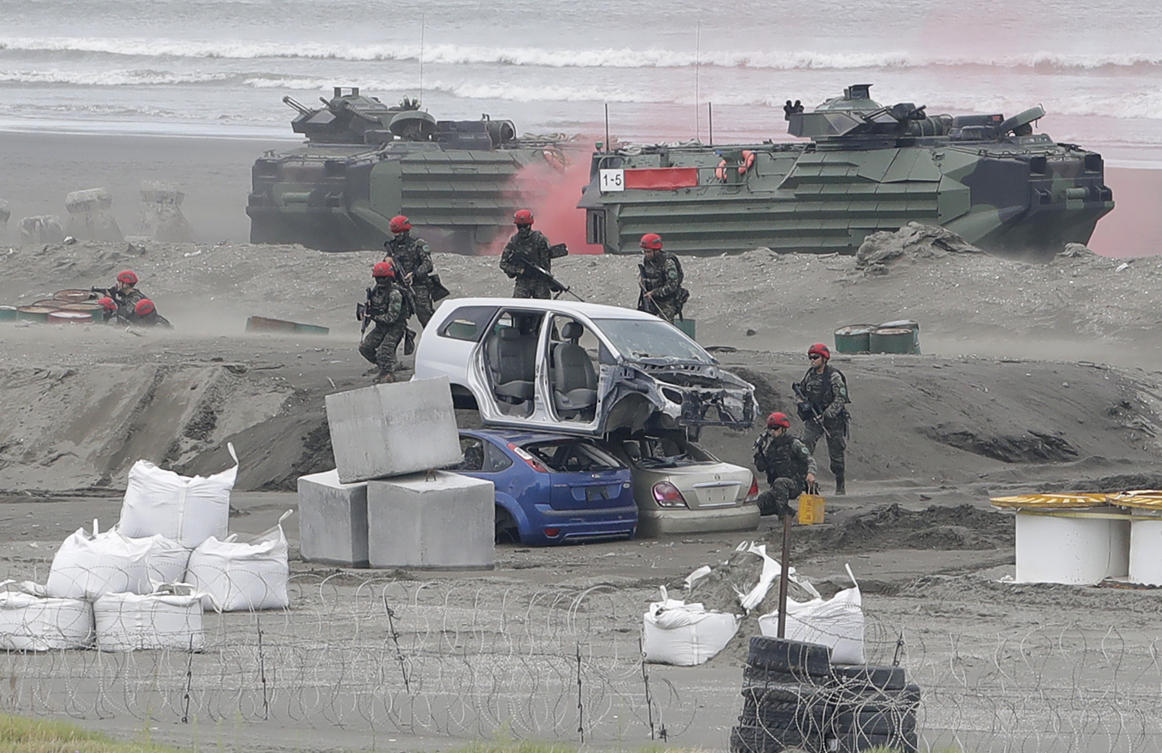 Taiwanese soldiers participate in the annual Han Kuang military exercises that simulate an anti-landing operations near the coast in New Taipei City on July 27, 2023. (AP)