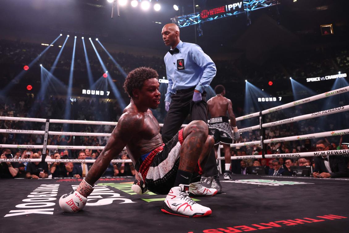 Errol Spence Jr. gets knocked to the mat by Terrence Crawford during round 7 of the World Welterweight Championship bout on July 29, 2023 in Las Vegas, Nevada. (Getty Images/AFP)