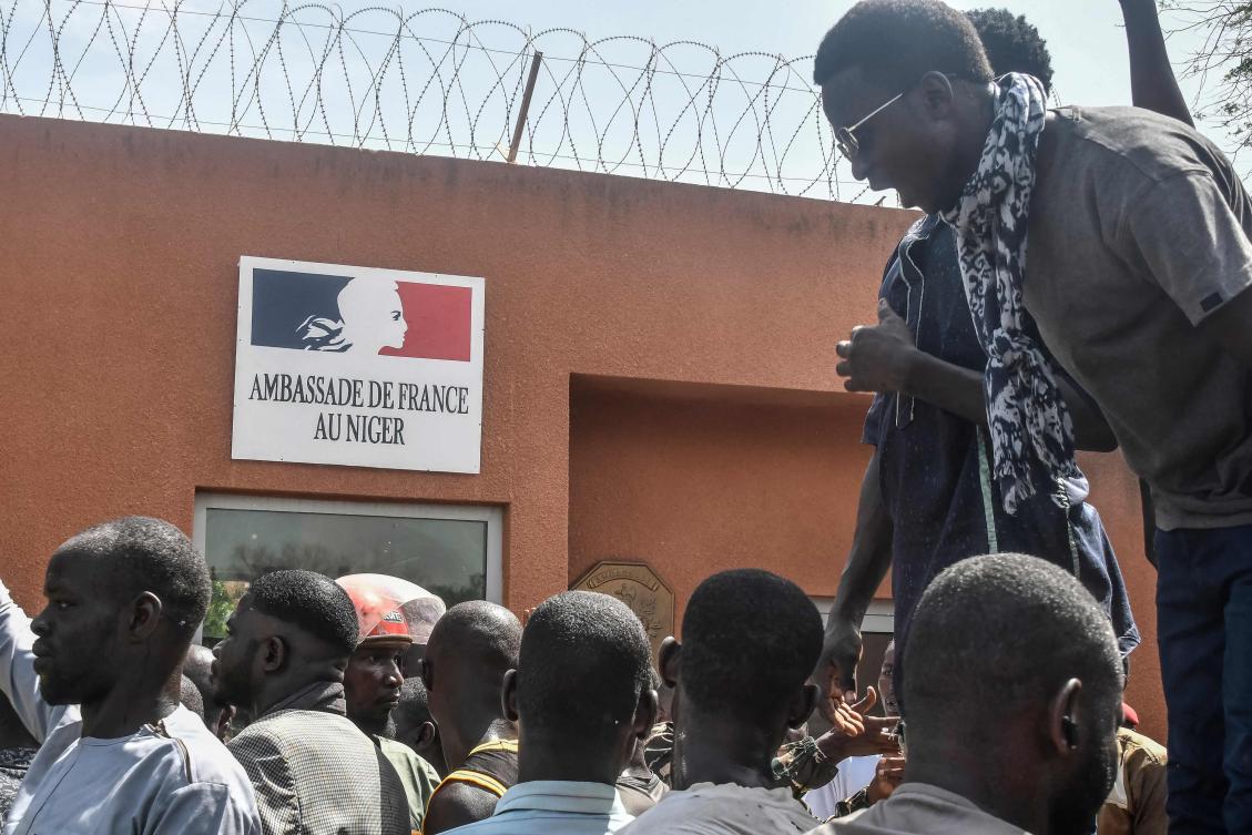 Protesters gather in front of the French Embassy in Niamey during a demonstration that followed a rally in support of Niger’s junta in Niamey on July 30, 2023. (AFP)