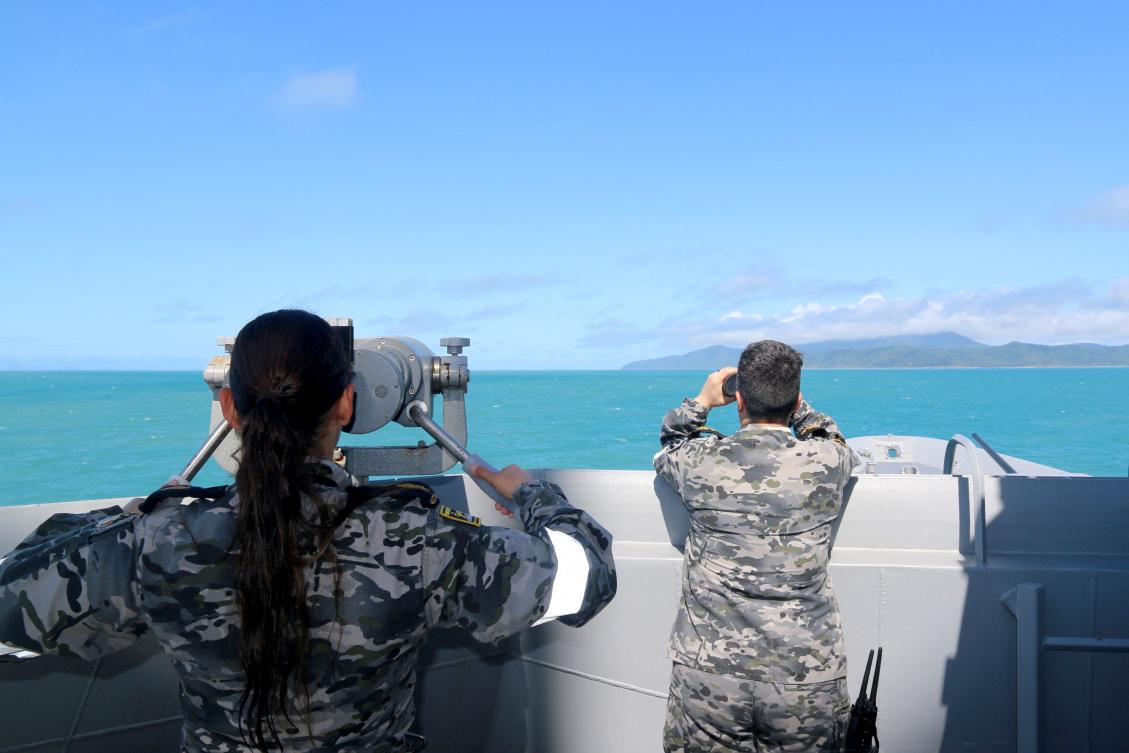 Above, Australian navy sailors conduct search and rescue operations in the vicinity of Lindeman Island, Queensland on July 29, 2023. (Australian Defense/AFP)