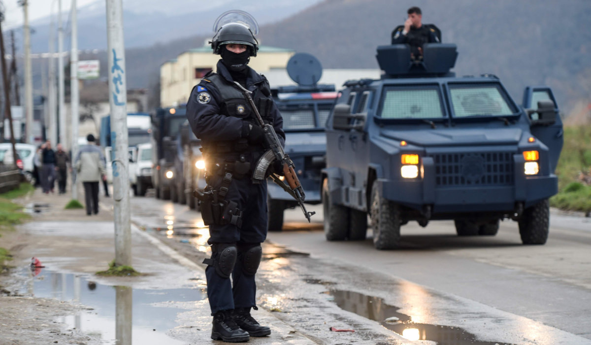 Members of the Kosovo police special unit stand guard in the town of Mitrovica. (AFP file photo)