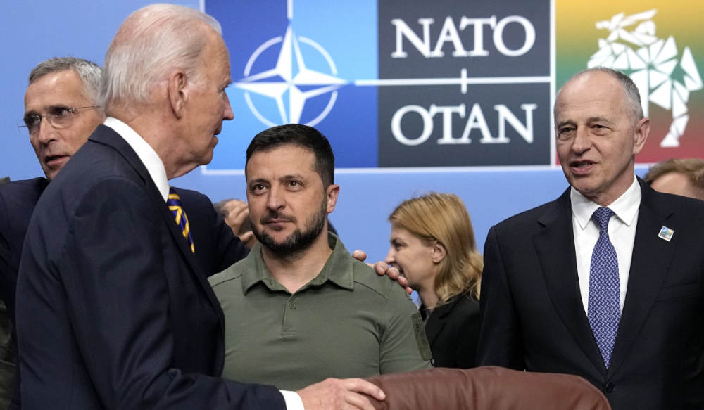 NATO Secretary General Jens Stoltenberg, Joe Biden, Volodymyr Zelenskyy and senior officials in Vilnius, July 12, 2023. (AP)