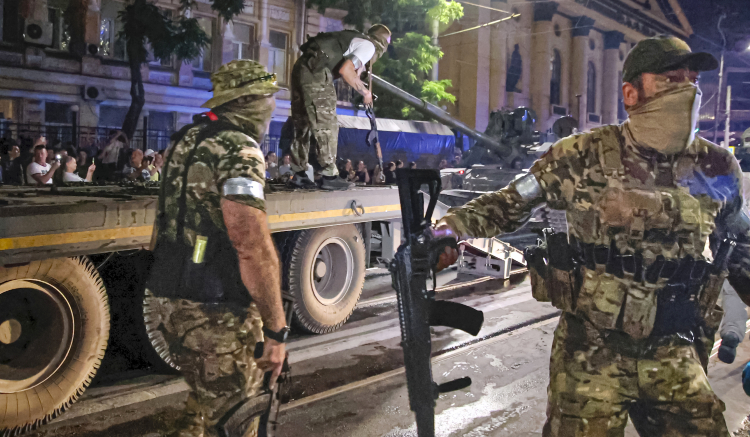 Members of the Wagner Group military company guard an area in Rostov-on-Don, Russia. (AP)