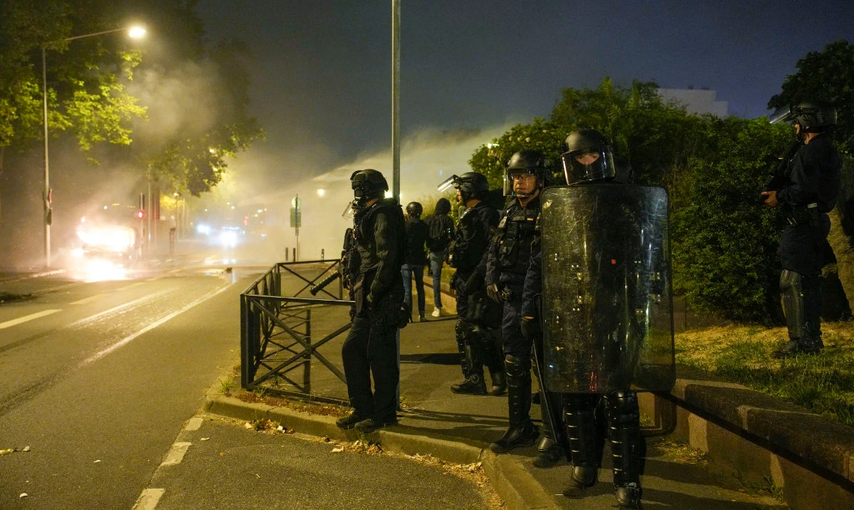 Police officers patrol in Nanterre, outside Paris, France, Saturday, July 1, 2023. (AFP)