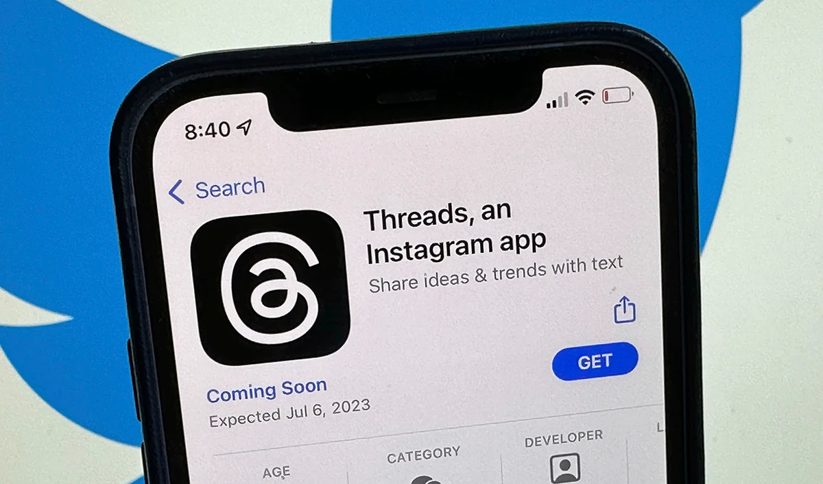 The announcement of the social media app 'Threads' is displayed in Apple's US App Store seen on the screen of a smartphone in Berlin, Germany, on July 4, 2023. (DPA via AP)