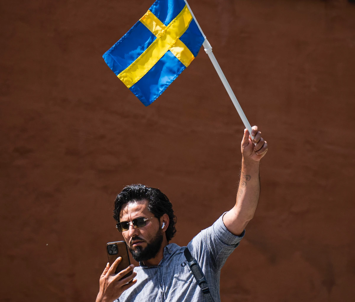 Salwan Momika protests outside a mosque in Stockholm on June 28, 2023, during the Eid Al-Adha holiday. (AFP)