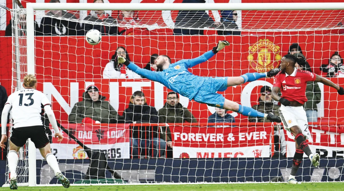 David de Gea saves a goal during a match. His contract with Man United expired at the end of June, with no new deal agreed despite talks that took place throughout the season. (AFP)