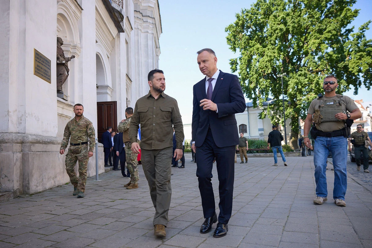 Ukraine's President Volodymyr Zelensky (L) converses with Poland's President Andrzej Duda (R) in the Polish city of Lutsk on July 9, 2023. (Ukrainian Presidential Press Service photo via AFP)