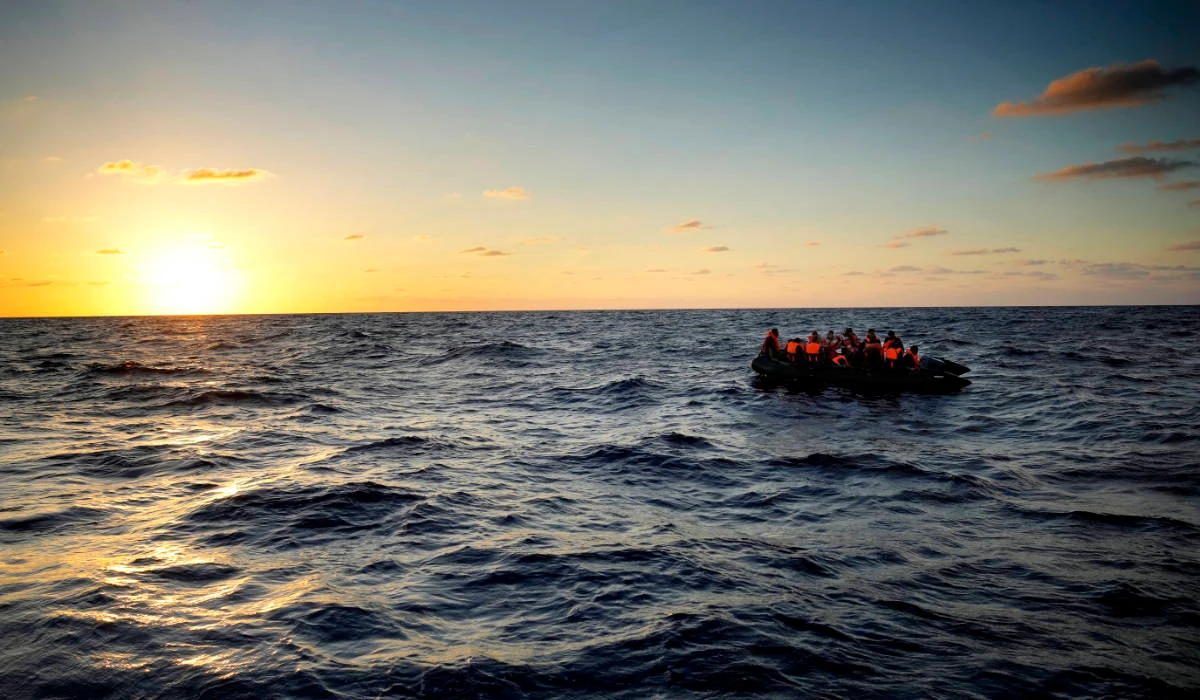 Migrants wait to be rescued by the Spanish NGO Open Arms lifeguards during a rescue operation at international waters zone of Libya SAR (Search and Rescue) in the Mediterranean sea, on Sept. 15, 2022. (AP)