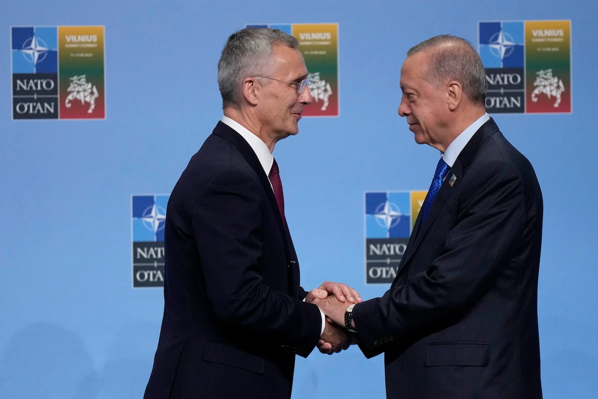 NATO Secretary General Jens Stoltenberg greets Turkish President Recep Tayyip Erdogan at a NATO summit in Vilnius, Lithuania, Tuesday, July 11, 2023. (AP)
