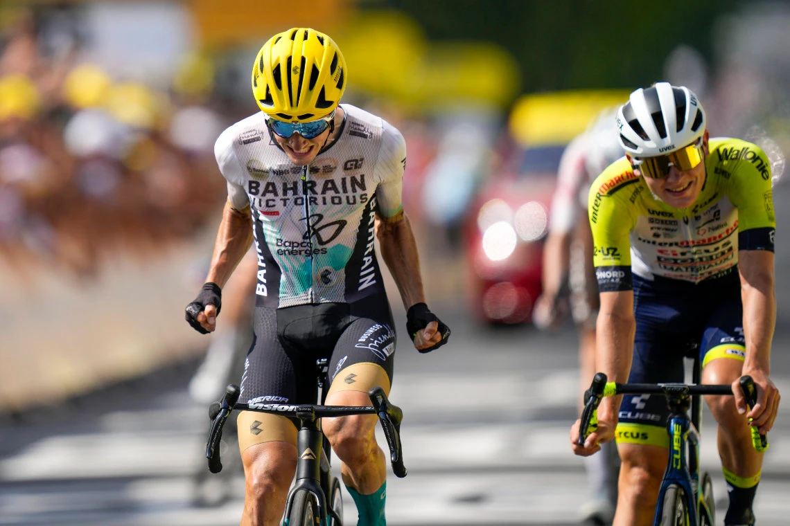 Spain's Pelle Bilbao crosses the finish line ahead of Germany's Georg Zimmermann, right, to win the 10th stage of the Tour de France cycling race over 167 kilometers (104 miles) with start in Vulcania and finish in Issoire, France, Tuesday. (AP)