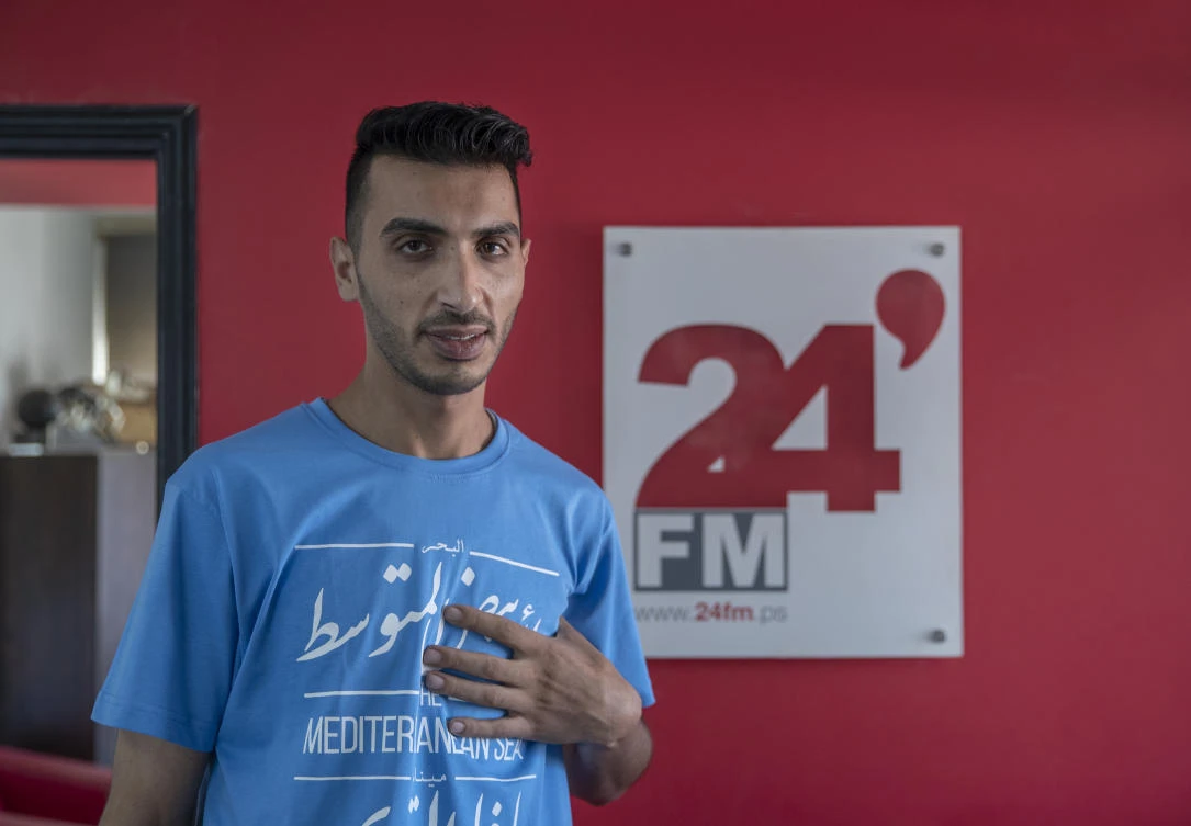 Palestinian journalist Akil Awawdeh poses for a portrait at his office in the West Bank city of Ramallah, on July 14, 2021. Palestinian security forces have detained Awawdeh after he wrote critical posts on social media, an activist group said on July 13, 2023. (AP/File)