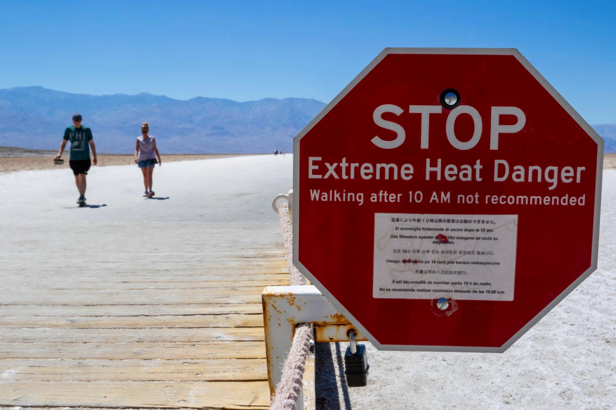 A sign stands warning of extreme heat on July 11, 2023, in Death Valley National Park, California. (AP)