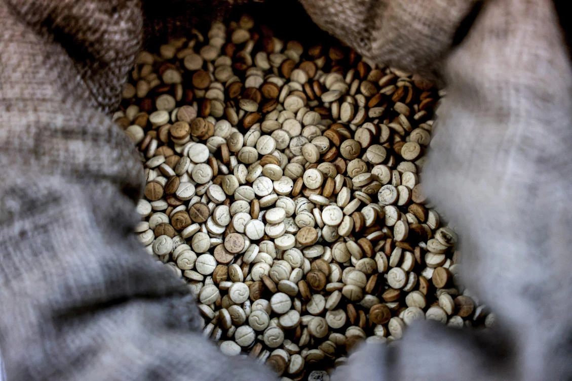 Sacks of confiscated captagon pills at the judicial police headquaters in Kafarshima, Lebanon. (File/AFP)
