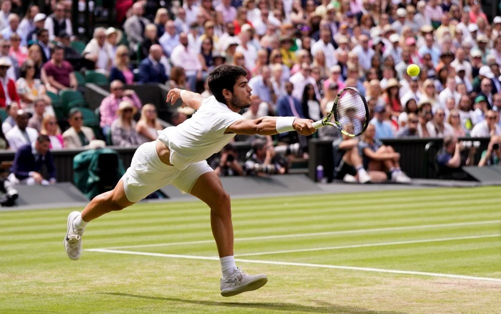 Spain’s Carlos Alcaraz in action against Serbia’s Novak Djokovic during the men’s singles final on day fourteen of the Wimbledon tennis championships in London, Sunday, July 16, 2023. (AP Photo)
