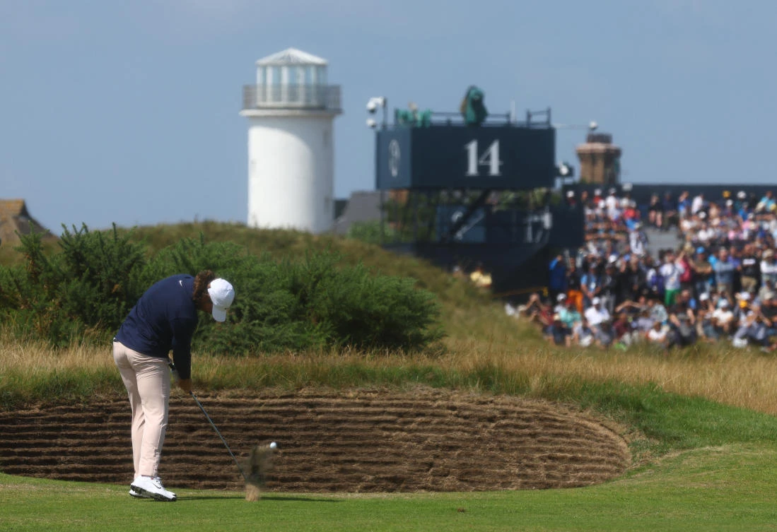 England’s Tommy Fleetwood in action on the 14th hole during the first round of the 151st Open Championship, Royal Liverpool, Hoylake, Britain, July 20, 2023. (Reuters)