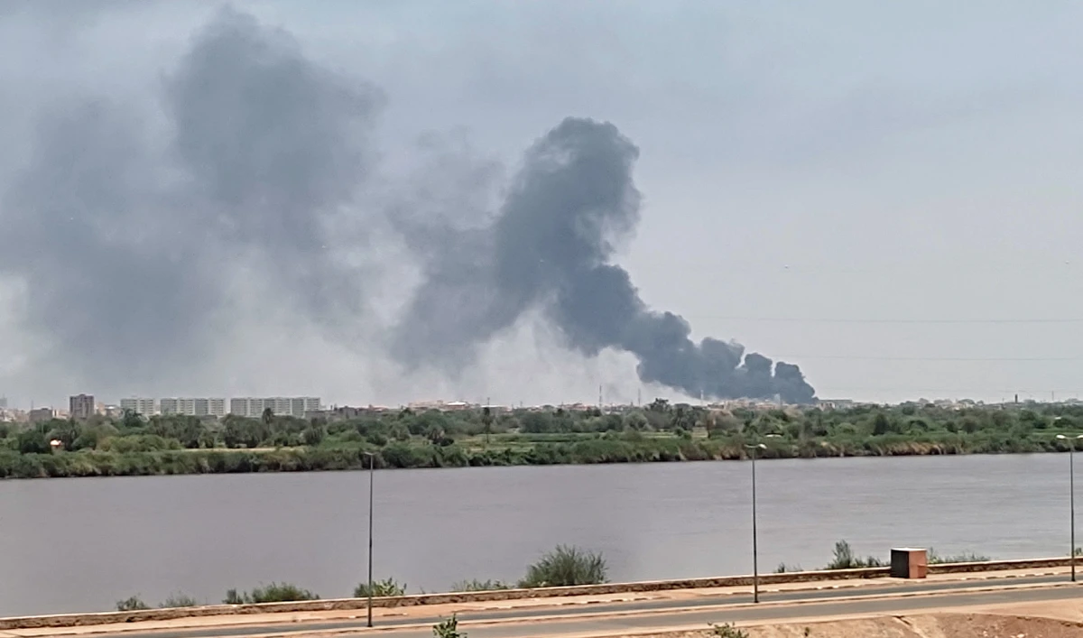A picture taken from Omdurman shows smoke billowing in the distance in Khartoum amid ongoing fighting in war-torn Sudan, on July 18, 2023. (AFP/File)