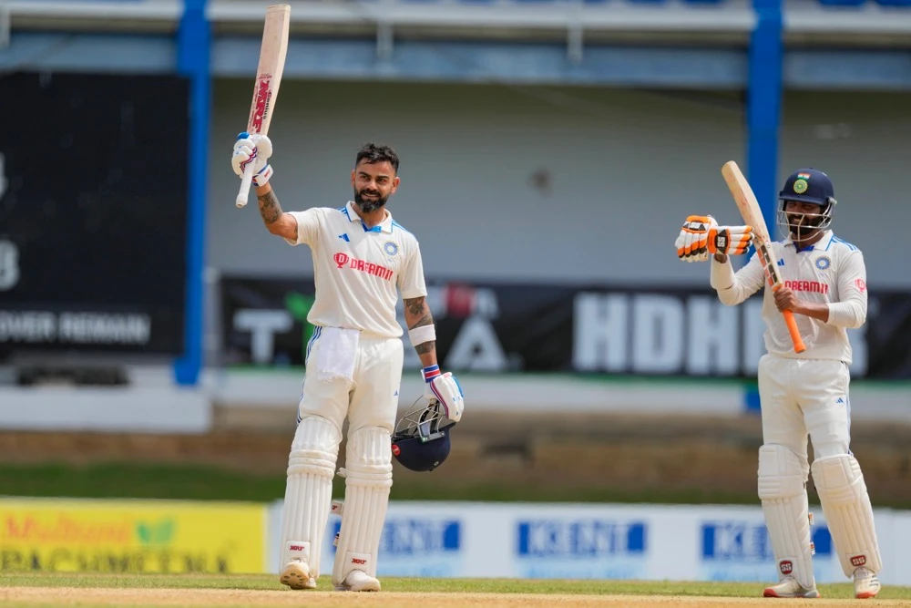 Virat Kohli celebrates after he scored a century against West Indies. (AP)