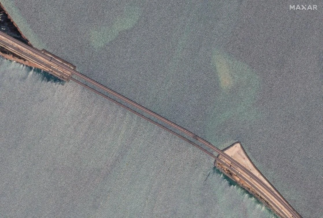 Kyiv drone strikes Crimea munitions depot as attacks escalate