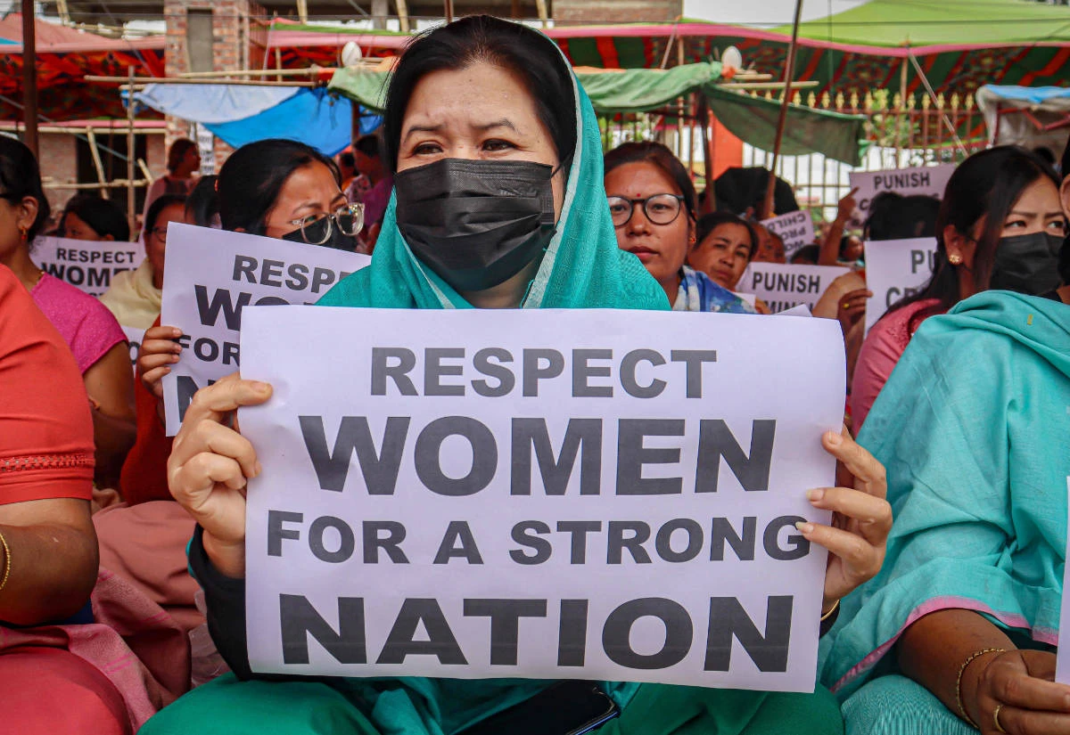 Women hold placards during a demonstration over sexual violence against women and for peace in the ongoing ethnic violence in India's north-eastern state of Manipur, in Imphal on July 21, 2023. (AFP)