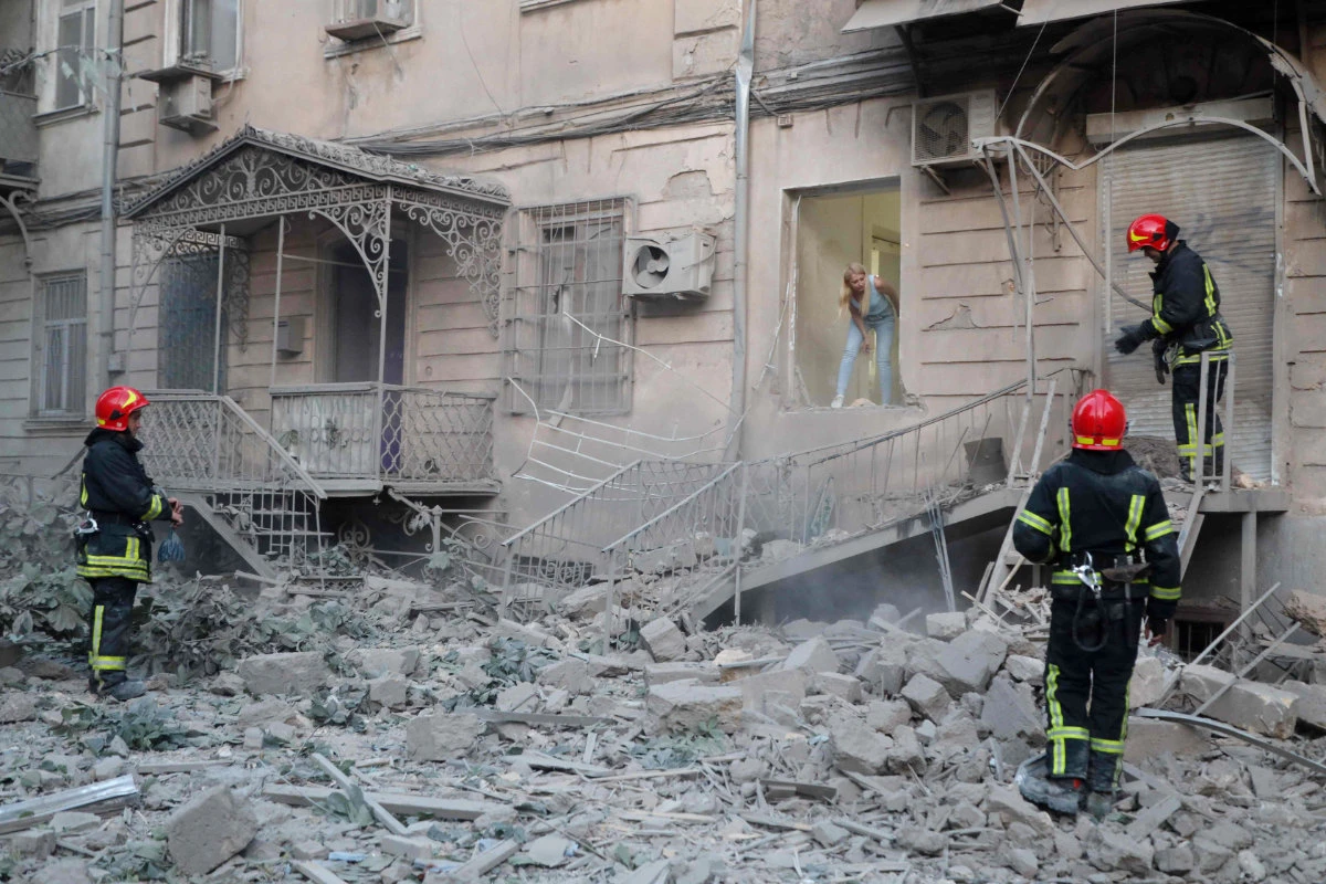 Ukrainian rescuers work at the site of a missile strike in Odesa, on July 23, 2023, amid the Russian invasion of Ukraine. (AFP)