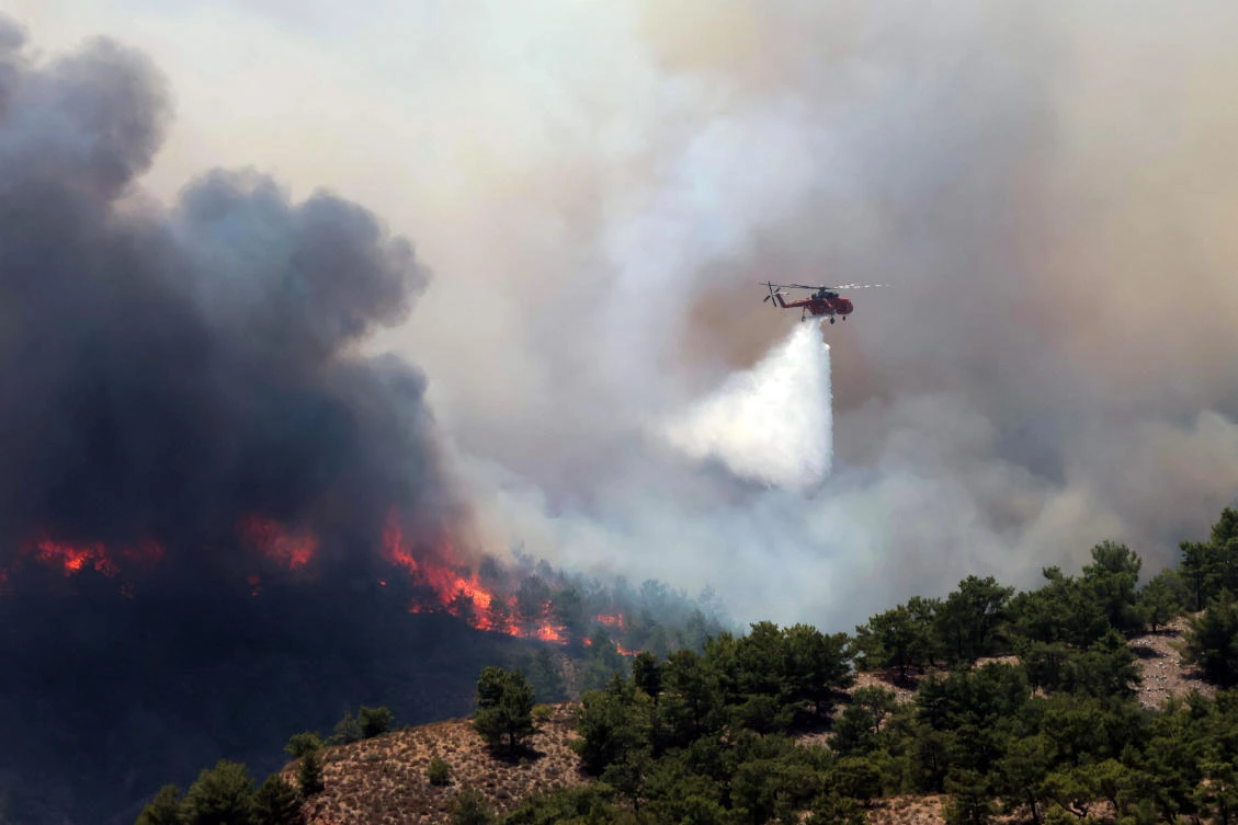 Thousands more evacuated as Greece ‘at war’ with forest fires