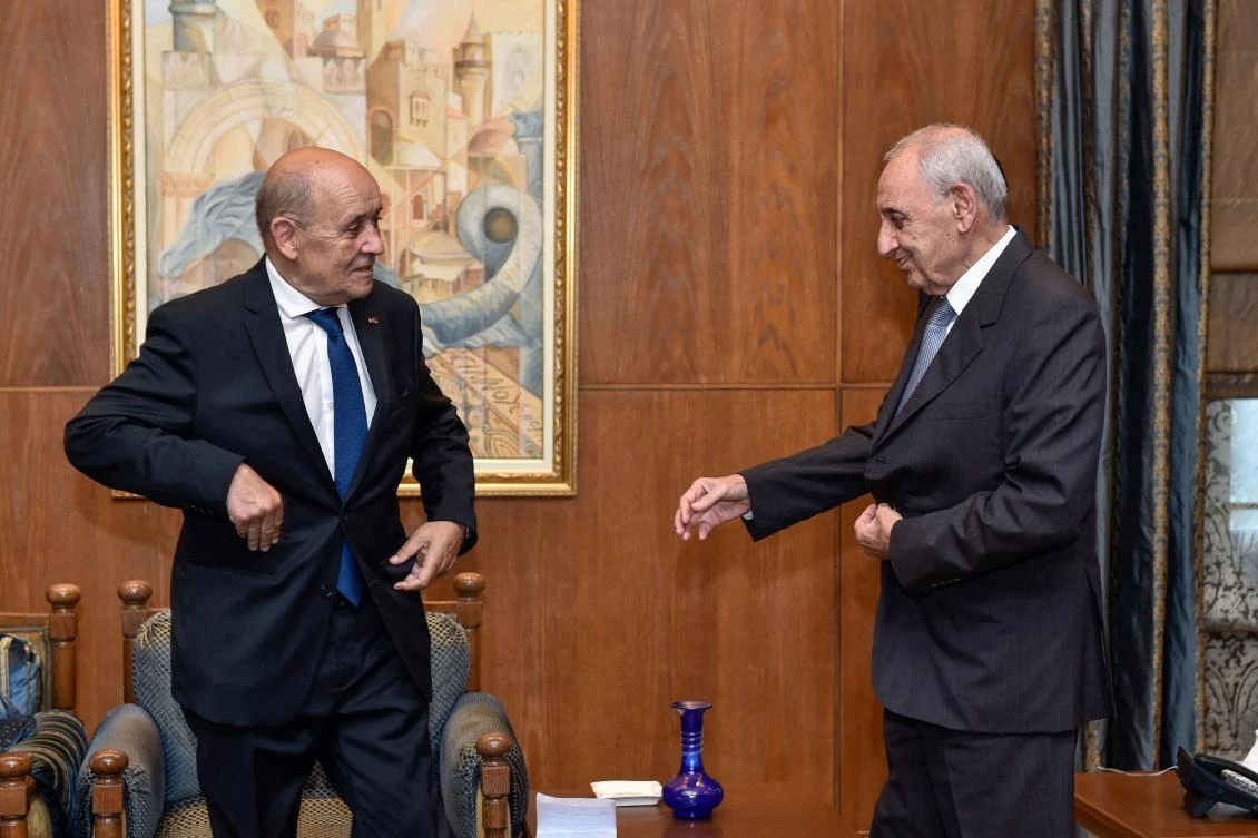 Lebanon’s Parliament Speaker Nabih Berri, right, receives French special envoy Jean-Yves Le Drian in Beirut, on July 25, 2023. (AFP)
