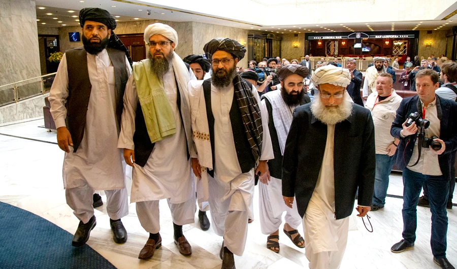 In this file photo, Mullah Abdul Ghani Baradar, the Taliban group's top political leader, third from left, arrives with other members of the Taliban delegation for talks in Moscow, Russia. (AP)