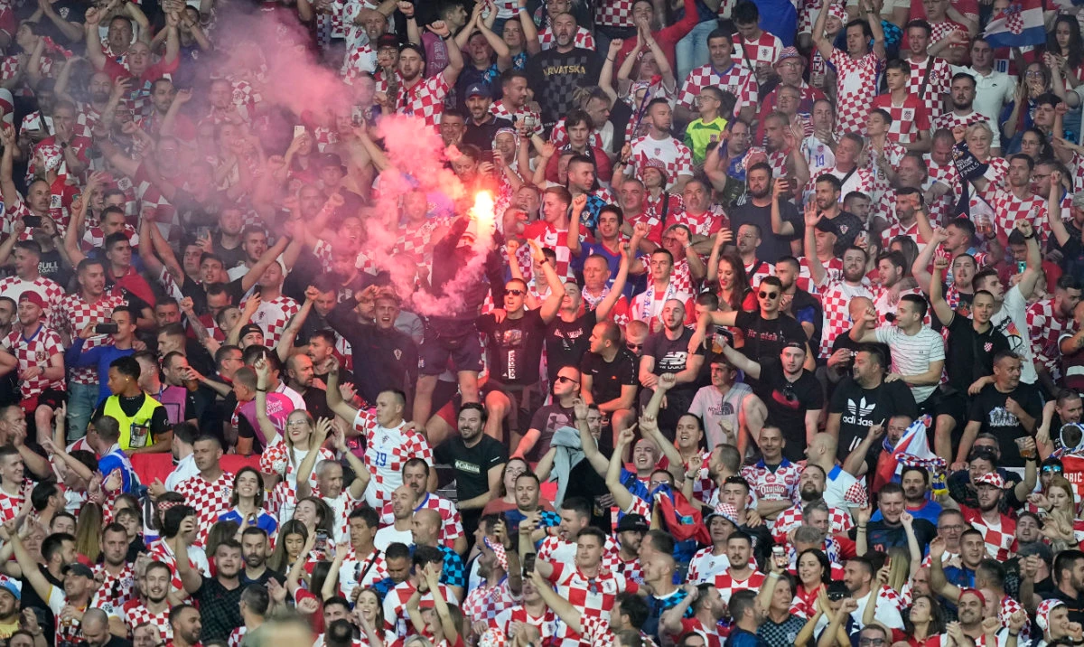 Croatia supporters light flares during the Nations League Finals between Croatia and Spain at De Kuip stadium in Rotterdam on June 18, 2023. Croatia’s soccer federation has been fined $165,000 by UEFA for offensive chants and disorder by fans at the Nations League Finals. (File/AP)